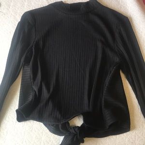 Black long sleeve open back knit top